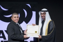 Ray Figueroa of Bronx Design and Construction Academy with the crown prince of Abu Dhabi.