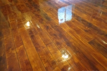 This concrete floor was stained, cut and treated to look like natural wood.