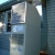 Evaporative cooling is more energy efficient because it cools air through evaporation of water.