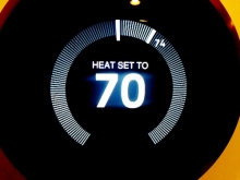The Nest thermostat clearly displays the current temperarure, and automatically adjusts it to save energy.
